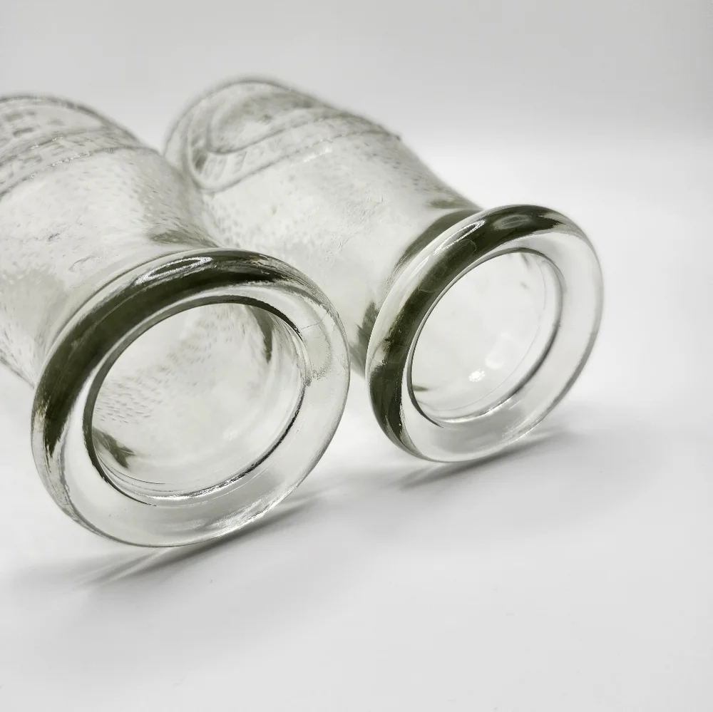 Set of two (2) Heritage Co. Vintage Milk Bottles. Roughly 5x3.5 inches. Cute! - Picture 3 of 5